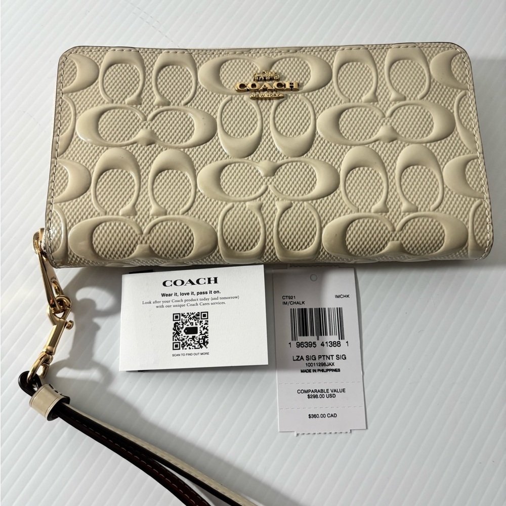 Coach Long Zip Around Wallet
In Signature Leather Chalk CT921